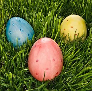 Easter eggs lying in grass
