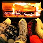 Image of feet by a fire